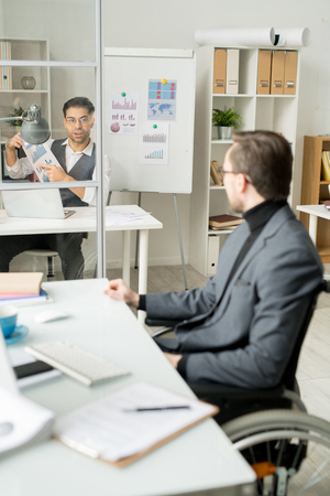 Businessmen working at officeの写真素材