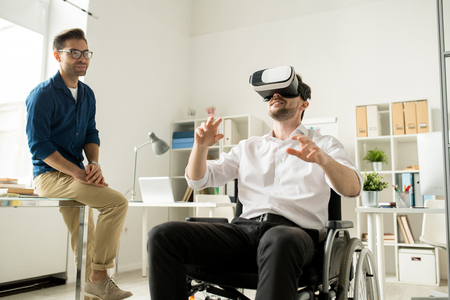 Business people using virtual reality in workの写真素材