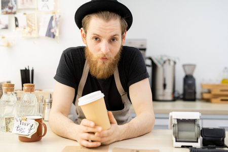Handsome barista in hatの写真素材