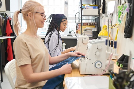 Seamstresses working in atelierの写真素材