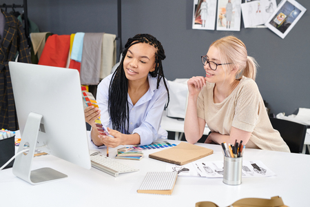 Designers choosing color for clothesの写真素材