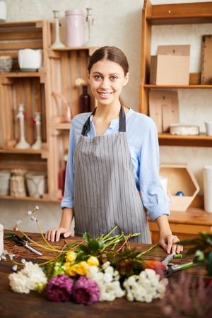 Smiling Florist in Flower Shopの写真素材