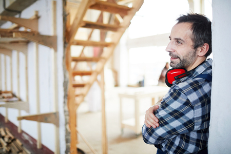 Content workman renovating houseの写真素材