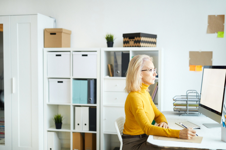 Mature Businesswoman Using Computerの写真素材