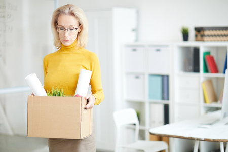 Mature Businesswoman Leaving Workの写真素材
