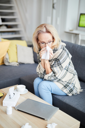 Sick Adult Woman at Homeの写真素材