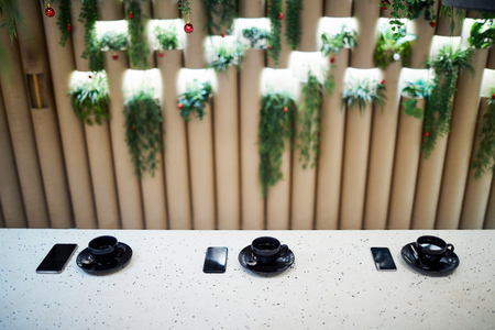 Tea and smartphonesの写真素材