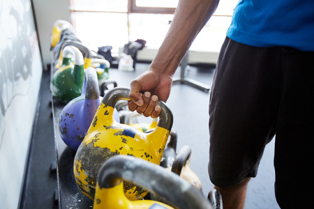 Taking kettlebellの写真素材