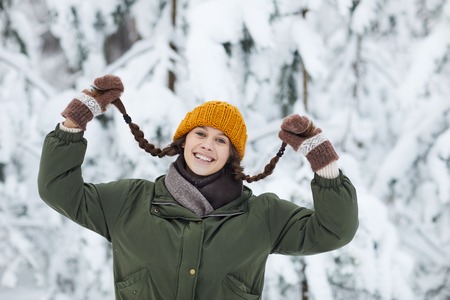 Young Woman having Fun in Winterの写真素材