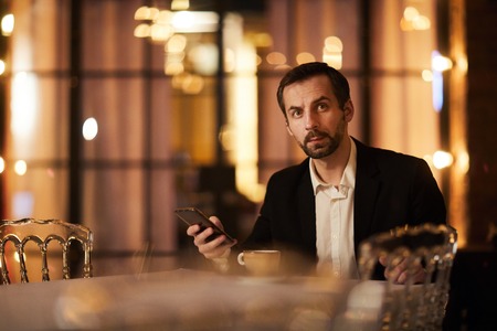 Gentleman Waiting in Restaurantの写真素材