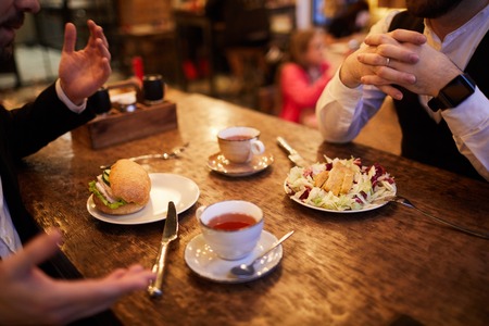 People Eating in Restaurant