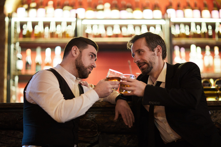 Two Gentlemen Drinking Alcoholの写真素材