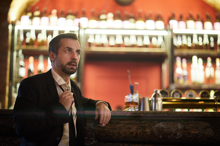 Businessman Waiting in Barの写真素材