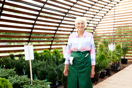 Senior Woman Posing in Gardenの写真素材