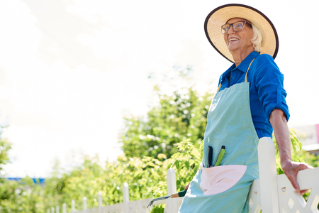 Senior Gardener in Sunlightの写真素材