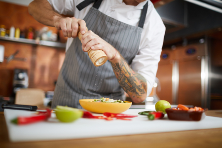 Chef Salting Dishの写真素材