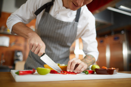 Chef Cutting Vegetables Closeupの写真素材