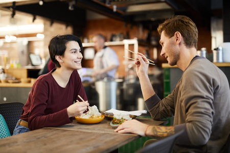 Couple in Chinese Food Restaurantの写真素材