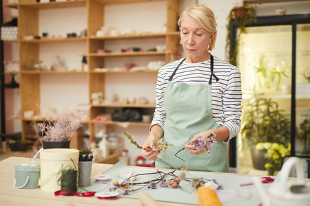 Female Florist Making Decorationsの写真素材