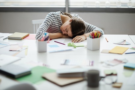 Student Asleep on Deskの写真素材