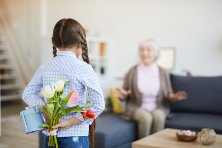 Girl Surprising Grandmaの写真素材
