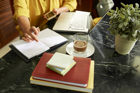 Businesswoman planning her workの写真素材