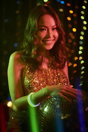 Young woman at nightclubの写真素材