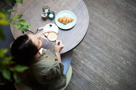 Having breakfast in coffee shopの写真素材