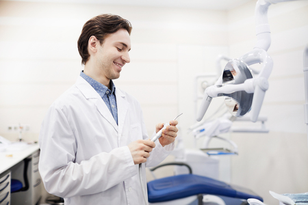 Smiling Young Dentistの写真素材