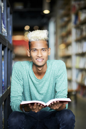 Cheerful student preparing for exam