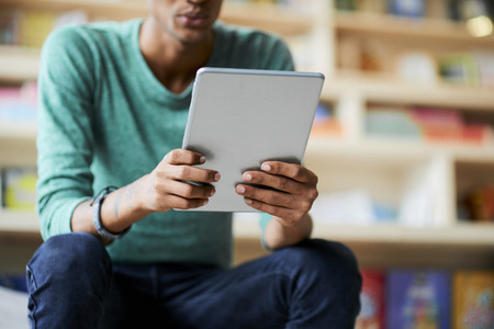 Using tablet to take online courseの写真素材