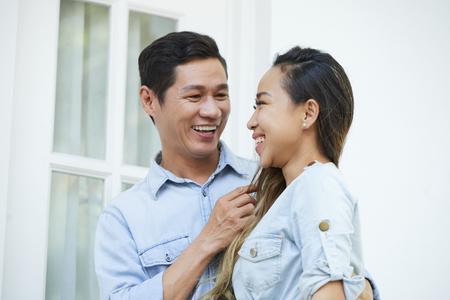 Happy man in love looking at girlfriendの写真素材