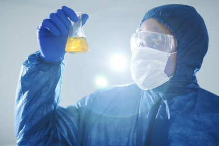 Examining urine sample in laboratoryの写真素材