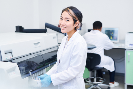 Smiling young laboratory workerの写真素材