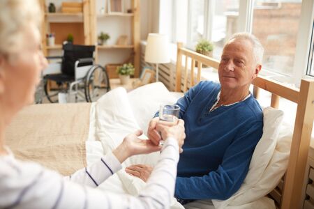 Senior Man on Bed Restの写真素材