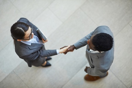 Shaking hands with new business partner