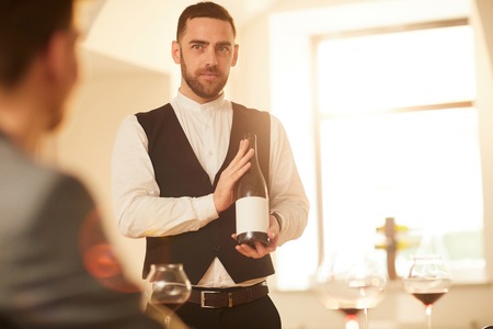 Waiter Presenting Wineの写真素材