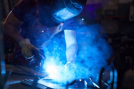 Mechanic using welding torchの写真素材
