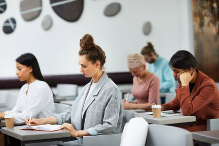 Group of Young People Studying in Classの写真素材