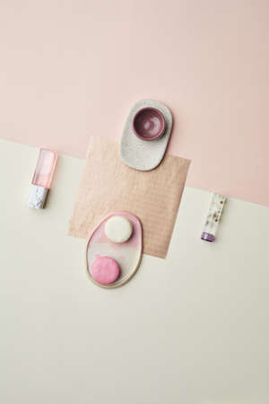 Minimal background image of pink pastel-colored objects in graphic composition, copy space