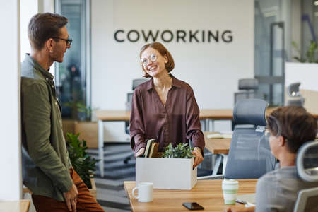Group of young people welcoming new employee in office, career and recruitment concept, copy spaceの写真素材