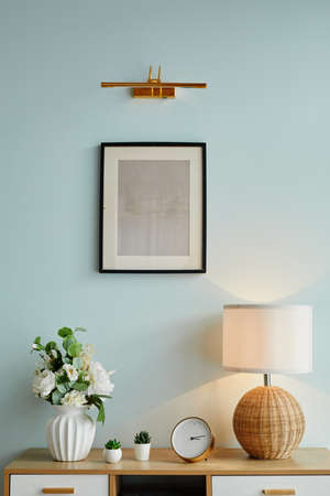 Vertical background image of minimal art on pastel colored wall in cozy home, copy spaceの写真素材