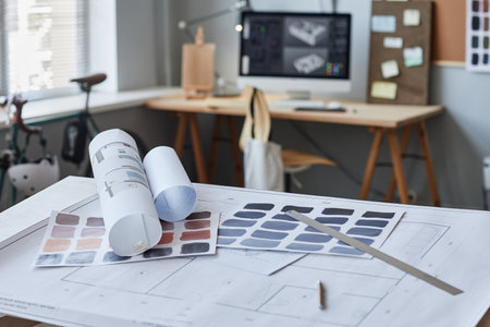 Background image of floor plans and color swatches in designers office, copy spaceの写真素材