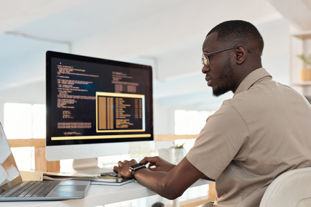 Serious programmer working on ways to automate and release processes