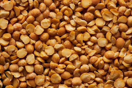 Grain texture background of dry yellow peas, macro shot with copy spaceの写真素材