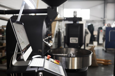 Side view background image of machines and equipment in coffee roastery workshop, copy spaceの写真素材