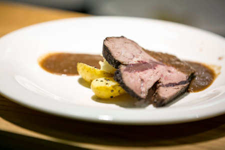 Roast beef with potatoes and gravyの写真素材