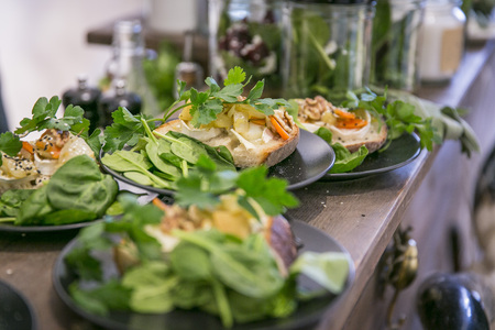 Catering sandwiches with cheese, vegetables and spinach