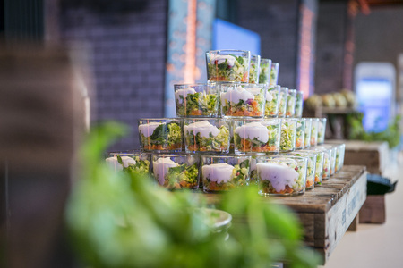 Catering / salad in glass with dressingの写真素材