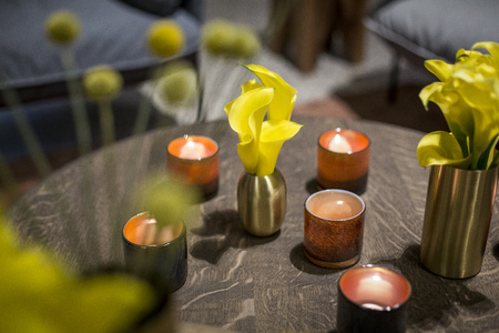 Table decoration with flowers and candlesの写真素材